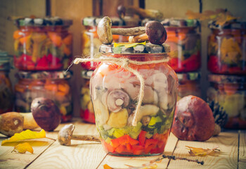 Autumn harvest mushrooms marinated vegetables jars