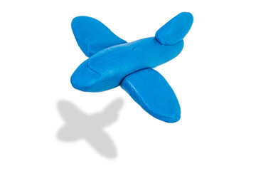 Model of an airplane from plasticine close-up on a white background with a characteristic shadow