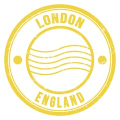 LONDON - ENGLAND, words written on yellow postal stamp