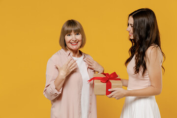 Side view two fun young surprised fun daughter mother together couple women in casual beige clothes...