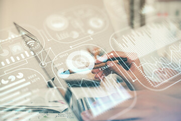 Double exposure of woman hands typing on computer and technology theme drawing. High Tech concept.