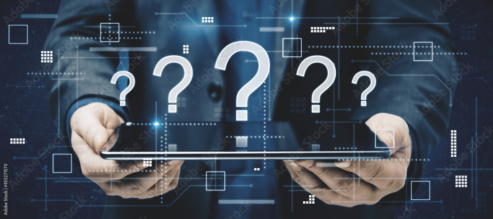 Aufkleber businessman hands holding tablet with creative glowing question marks interface on dark background. 