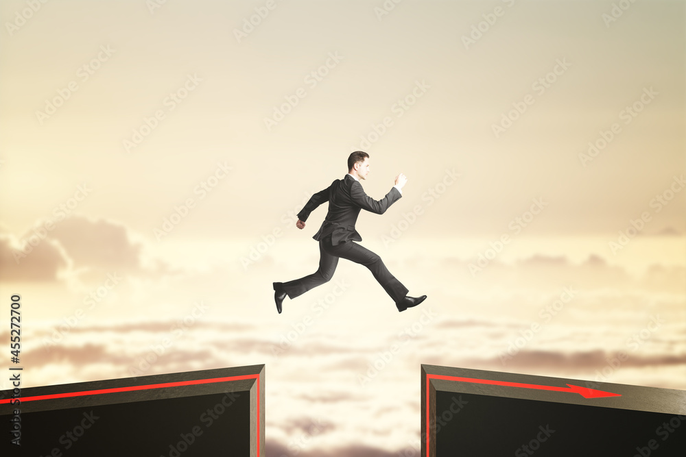 Poster Side view of business man jumping over gap on sky background with mock up lace. Challenge and success concept.