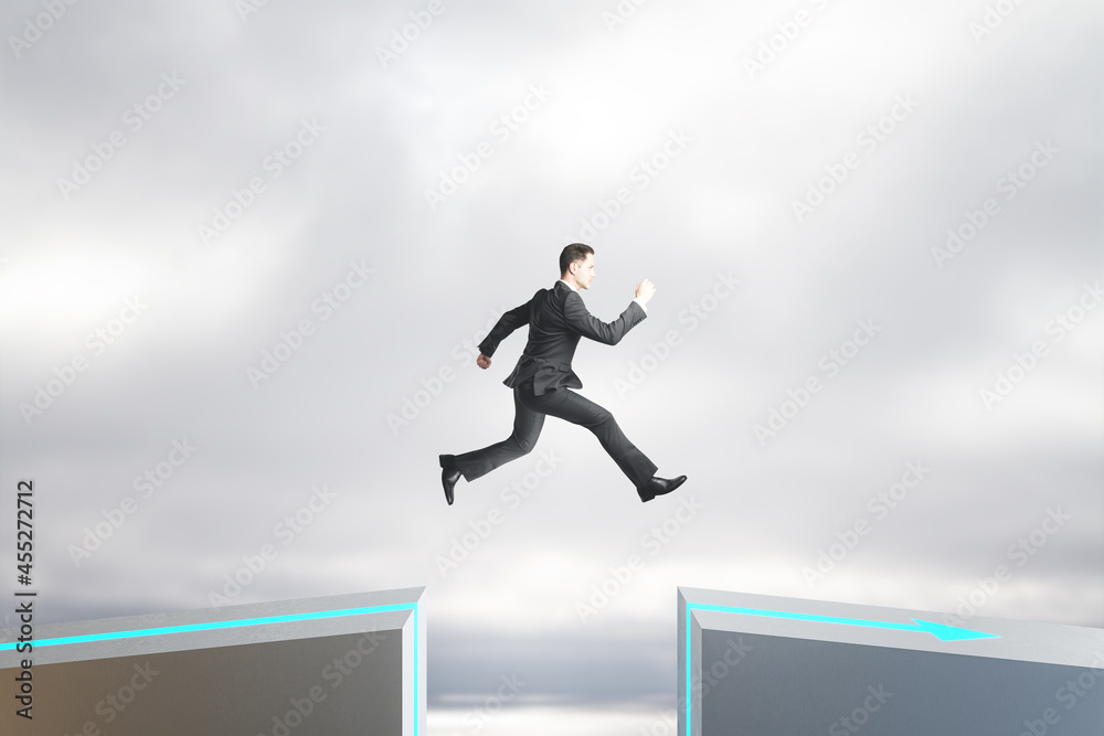 Poster Side view of businessperson jumping over gap on sky background with mock up lace. Challenge and success concept.