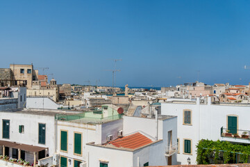 Fototapeta na wymiar Otranto, Apulia, Italy - August, 17, 2021: view of the town of Otranto from the Aragonese castle