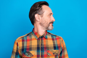 Profile photo of cool brunet hairdo age man look wear plaid shirt isolated on blue color background