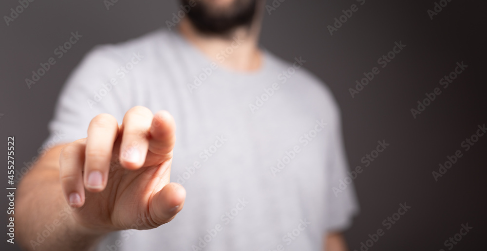 Poster Hand pushing on a touch screen..