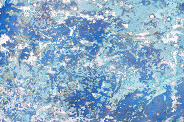 The texture of old shabby paint on a boat