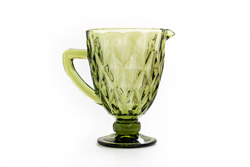 green glass carafe for drinks. tableware for the dining room.