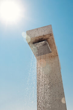 Beach Shower With Clean Fresh Water To Rinse Off Sea Salt And Sand After Swimming