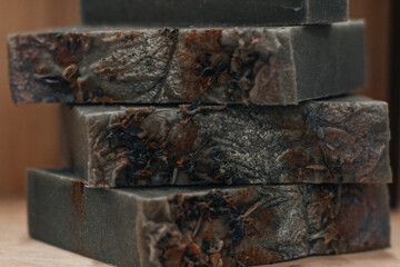 Handmade natural soap on wooden background. Spa natural treatments. Organic natural soap for spa and wellness products.