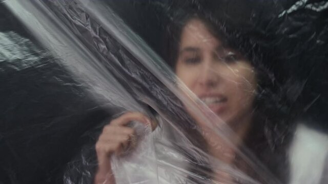 trapped woman freedom deprivation plastic wrap