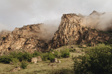 Steep mountains in the fog