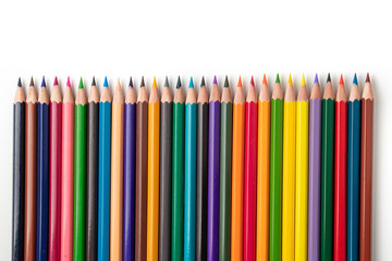 Colour pencils isolated on white background close up
