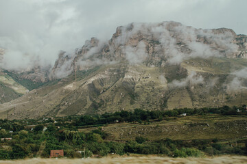 Steep mountains in the fog