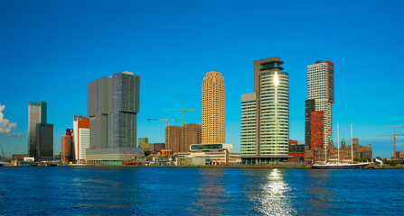 Fototapeta premium Rotterdam skyscrapers skyline view over of Nieuwe Maas river. Rotterdam