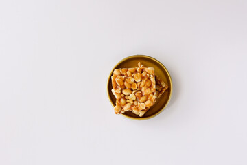 Peanut chikki candy gajak Diwali sweets Indian Sweet dessert mithai festival dish Dussehra Holi ganesh chaturthi Ram navami Durga pooja, durga ashtami Navratri Mumbai Kerala India Pakistan