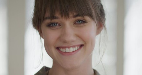 Portrait beautiful young woman smiling at home