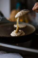 The process of making vegan pumpkin pancakes