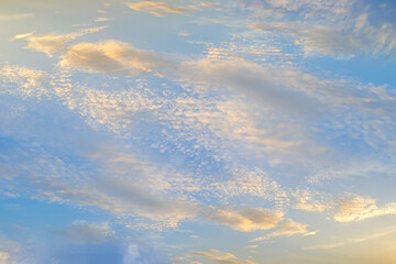 Dramatic sunset sky soft cloudy is gradient pastel, Abstract sky background . Image contain certain grain or noise and soft focus.