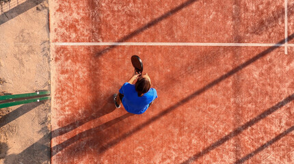 View from above of a padel player who is in his position waiting to hit the ball