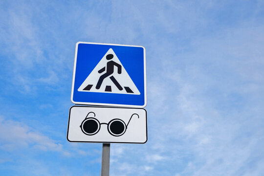 Combination of international signs 'Pedestrian crossing' and 'Blind pedestrians' (or 'visually impaired pedestrians')