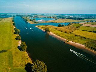 Aerial drone view of the Meuse or Maas river in the Netherlands, Europe.