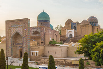 View of the Shakhi-Zinda complex at sunset. Shot in Samarkand, Uzbekistan. Inscription translation: 'This building was founded by Bahadur son of Ulugbek etc'