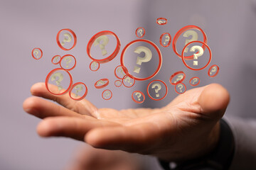 Businessman solving problem with digital question marks 3D rendering