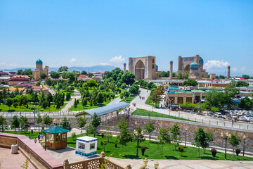 Fototapeta na wymiar Panorama of Samarkand, Uzbekistan. Parks and pedestrian streets are visible. 15th century Bibi Khanym historical complex is visible in distance