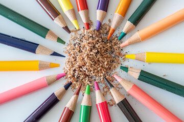 Sharpening color wheel selection of professional artists colored wax based pencils for an artwork - Powered by Adobe