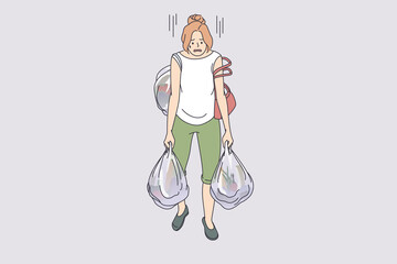 Carrying heavy bags tiredness concept. Young exhausted tired woman cartoon character going carrying many heavy shopping bags full of food from supermarket vector illustration 