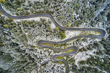 Foto op Aluminium aerial view of road path on mountain cliff © Johny