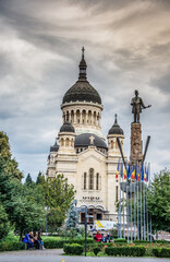  Avram Iancu statue  and Dormition of the Theotokos Cathedral, Cluj-Napoca , Romania ,august 2021