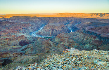 landscape with Fish River Canyon in south Namibia: view into the canyon at sunrise
