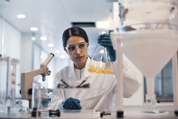 Female scientist working in a science laboratory