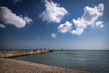 Fototapeta na wymiar Beach and jetty at Rye Harbour, Sussex, England