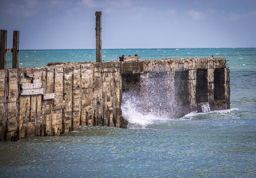 Old wooden jetty at Rye Harbour, Sussex, England - Powered by Adobe