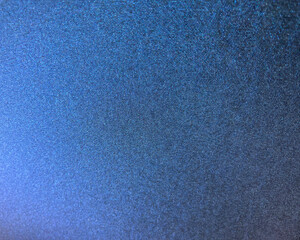 Blue duochrome iridescent shimmer holographic coloured paper abstract background 