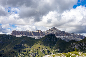 Sass Pordoi (aka the Terrace of the Dolomites) and Piz Boè seen from Marmolada. Cloudy landscape of Dolomites. Dolomites Alps , Trentino Alto Adige, Italy