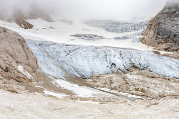 the Marmolada and his glacier on the Dolomites mountains. Alps, Dolomites, Passo Fedaia, Trento, Italy