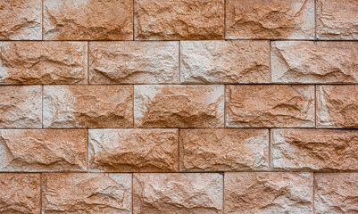 Rough beige brick wall background