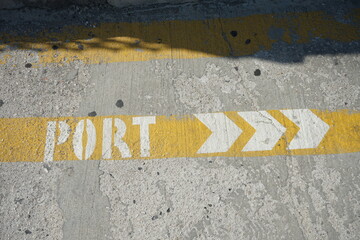 pedestrian cruise port sign painted onto the street