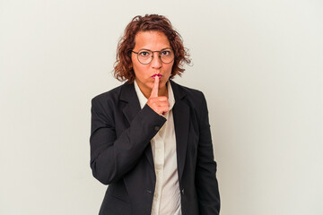 Middle age latin business woman isolated on white background keeping a secret or asking for silence.