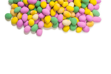 Group of colorful peanuts in glaze.