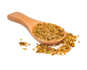 Dried aromatic spices in wooden spoon isolated on the white background