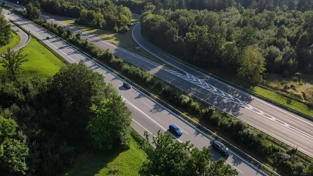 Drone Aerial view of a german Autobahn motorway highway in 4k UHD, lots of cars traffic