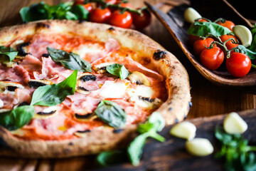 Fototapeta na wymiar delicious Italian pizza with fresh ingredients
