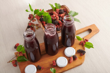 Mulberry Shrub, Juice or liqueur in glass bottles, mulberry juice for health, reduce cholesterol, control blood sugar, antioxidants, nourish the brain, cancer prevention, stimulates blood flow.