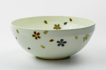 Japanese porcelain with minimal floral pattern on a white background